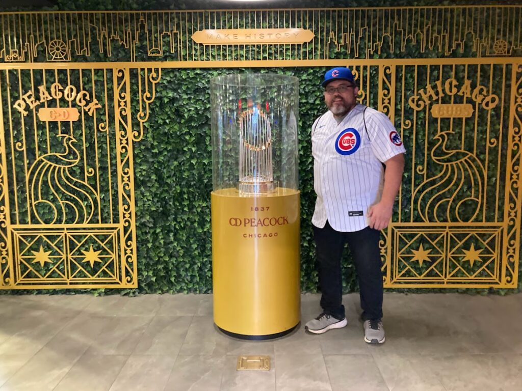 Standing with the 2016 World Series trophy