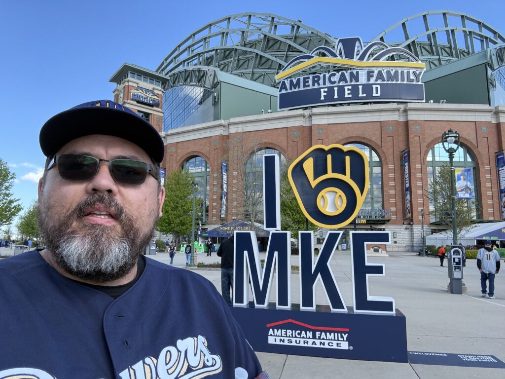 Standing in front of the I Heart MKE sign at American Family Field