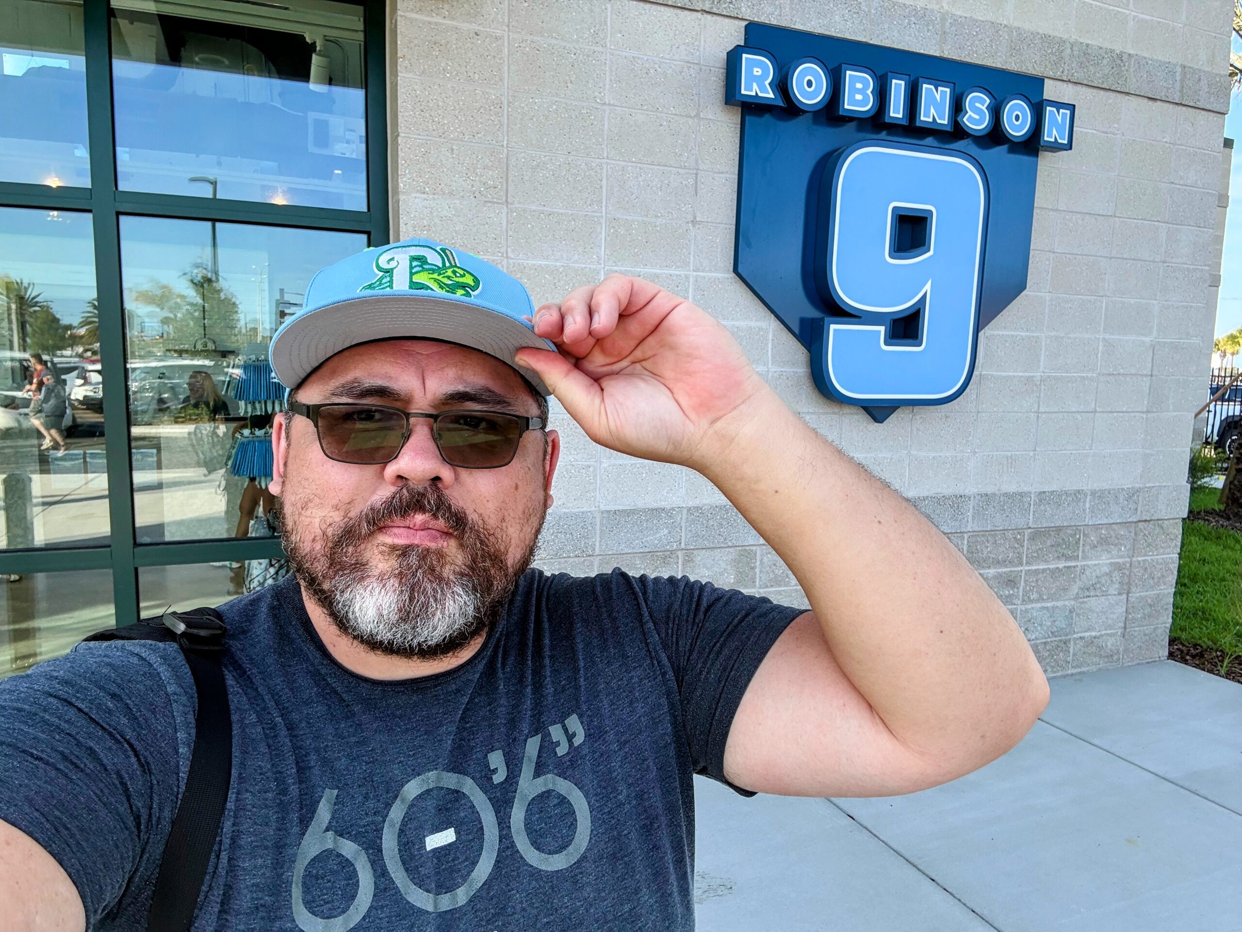 Standing in front of Jackie Robinson's retired #9